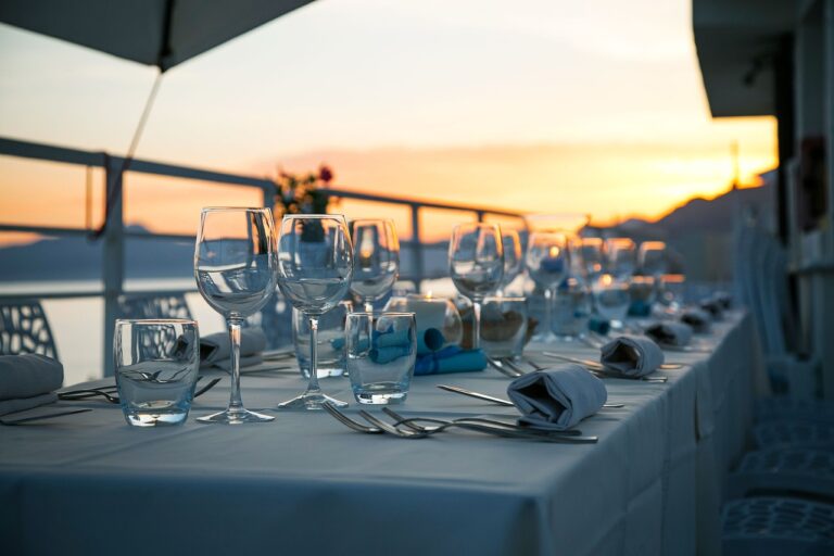 table, glassware, cutlery, silverware, stemware, dining table, dinner table, nature, table setting, table set-up, dinner, luxury, restaurant, sunset